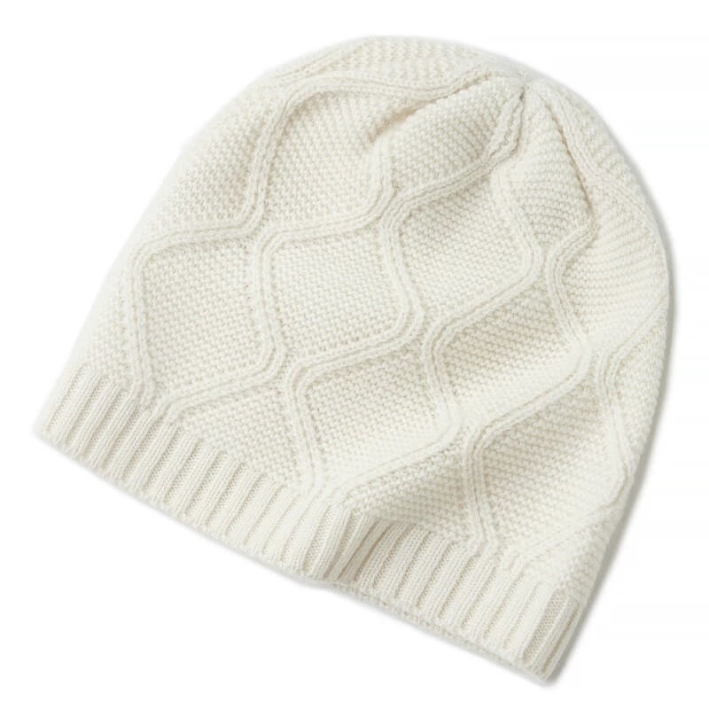 White knit beanie on a white background