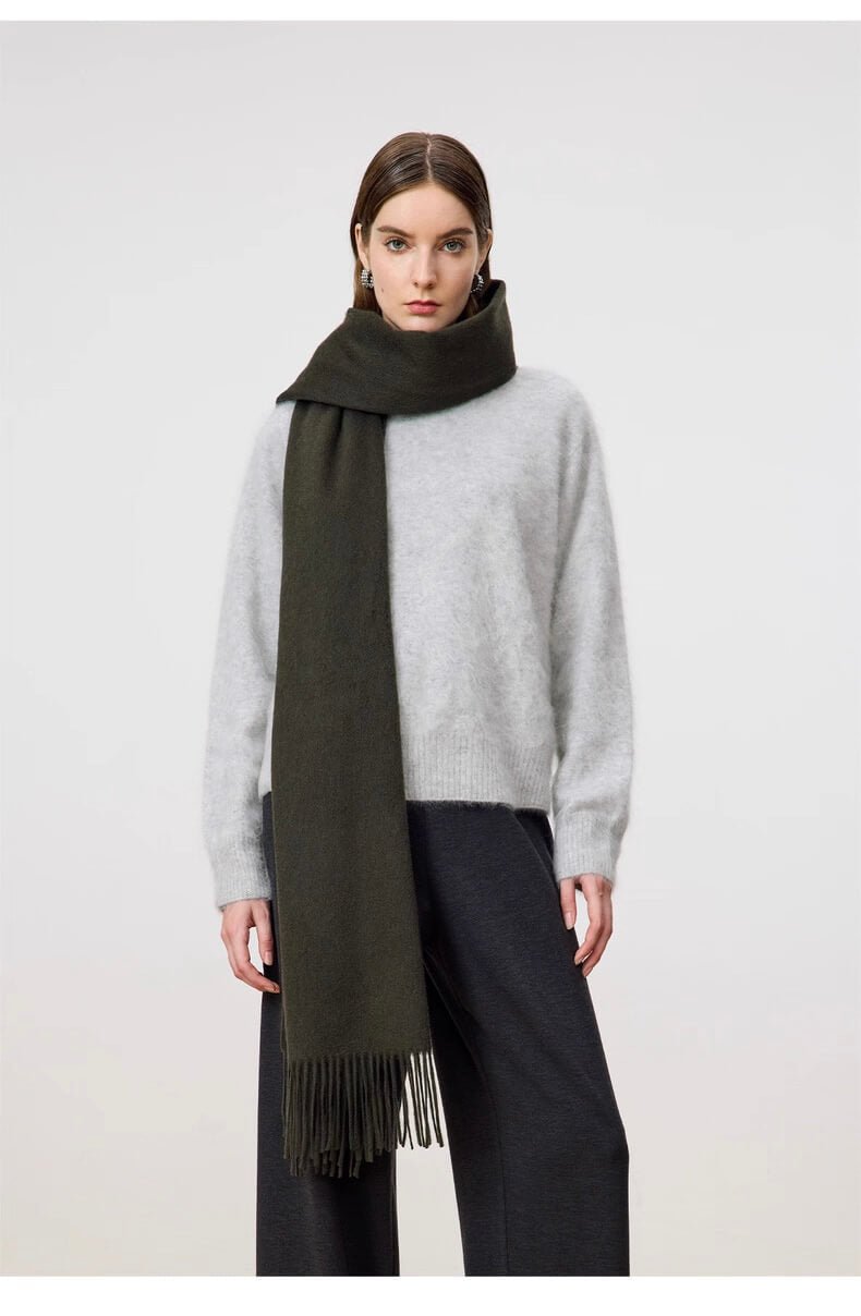 Woman wearing a army green 100% cashmere shawl scarf, luxury cashmere wrap