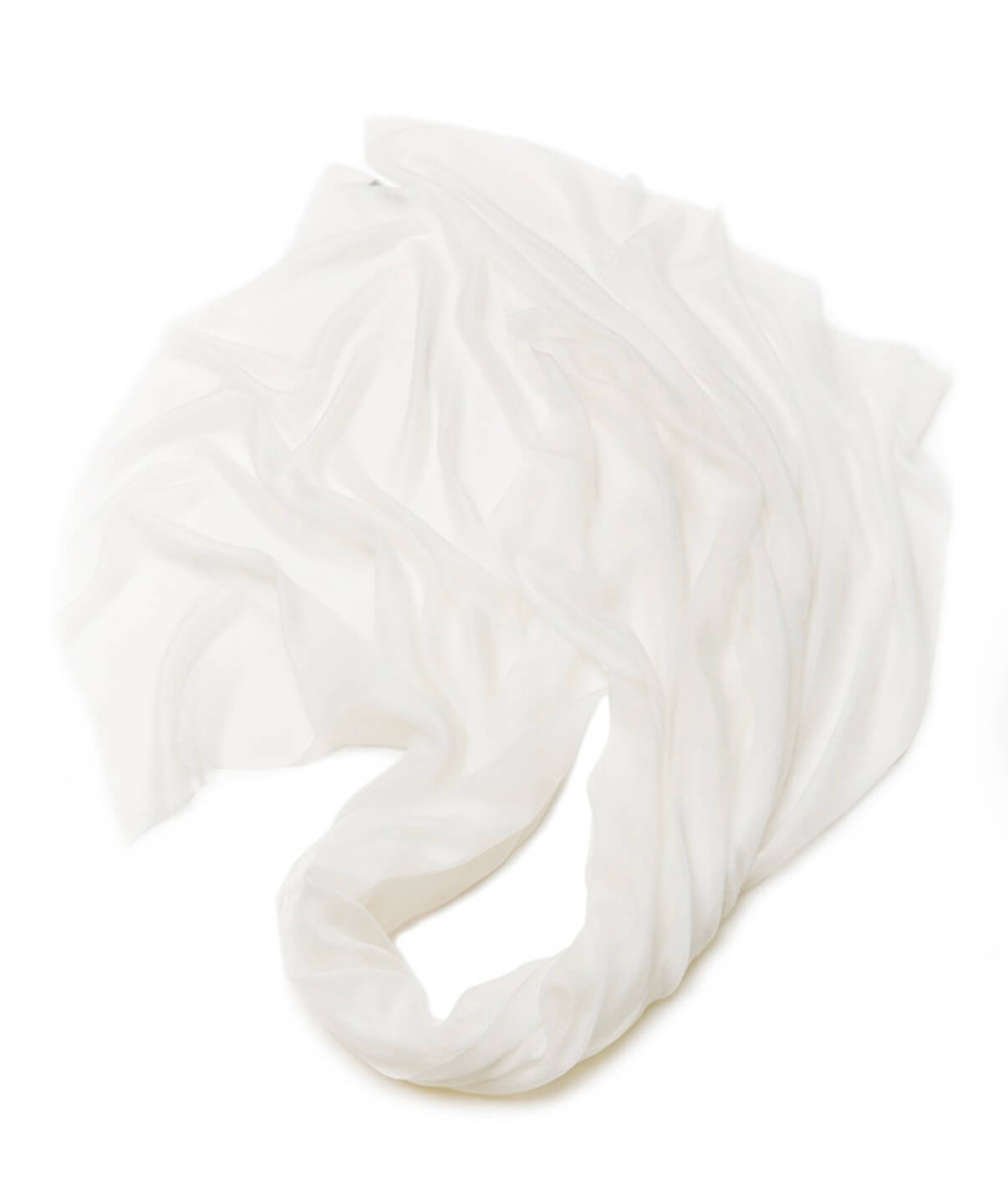 Lightweight white cashmere wrap draped over shoulders for summer styling