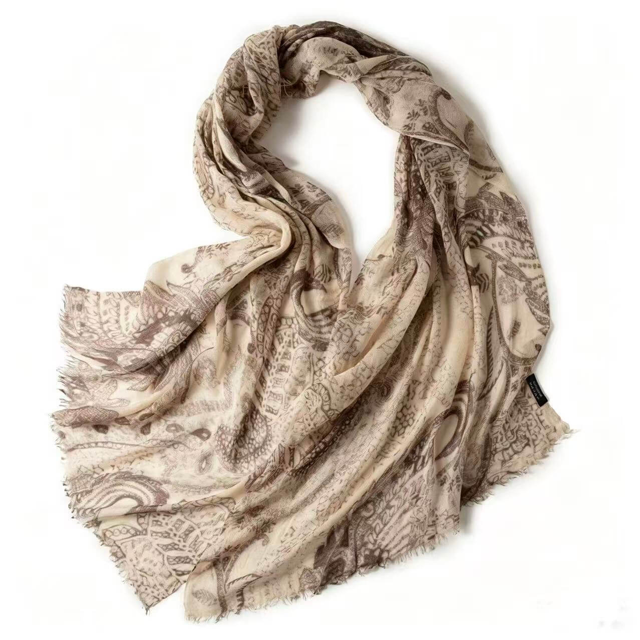 Cashmere wrap styled over shoulders for a summer evening look