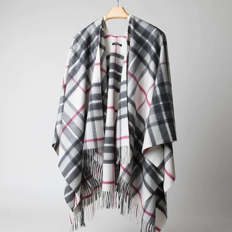 Winter cashmere cape ideal for skiing and outdoor warmth