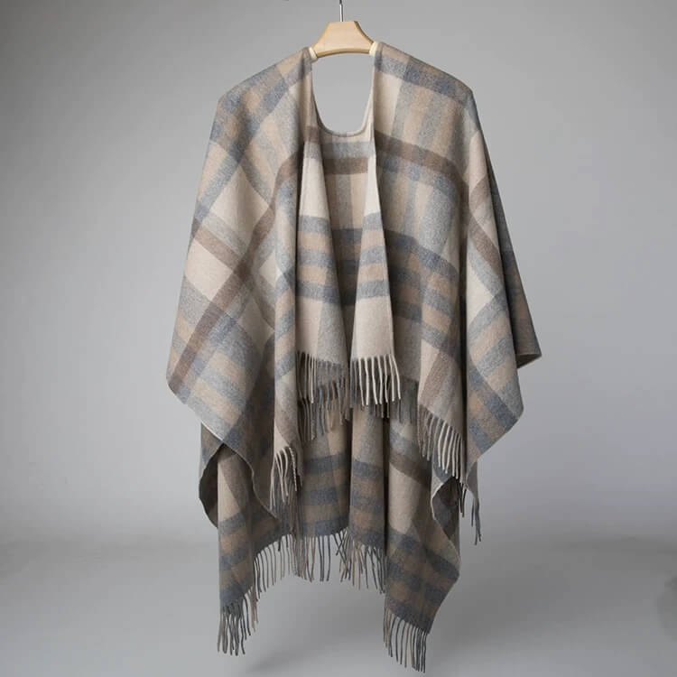 Cashmere travel wrap cape shown draped on shoulders