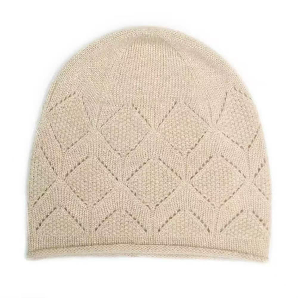 A light beige knit pure cashmere beanie hat featuring a textured geometric diamond pattern