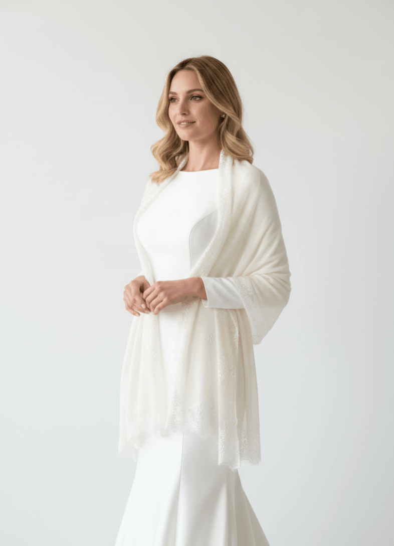 Bride wearing a soft 100% cashmere wedding shawl for outdoor ceremony and evening reception