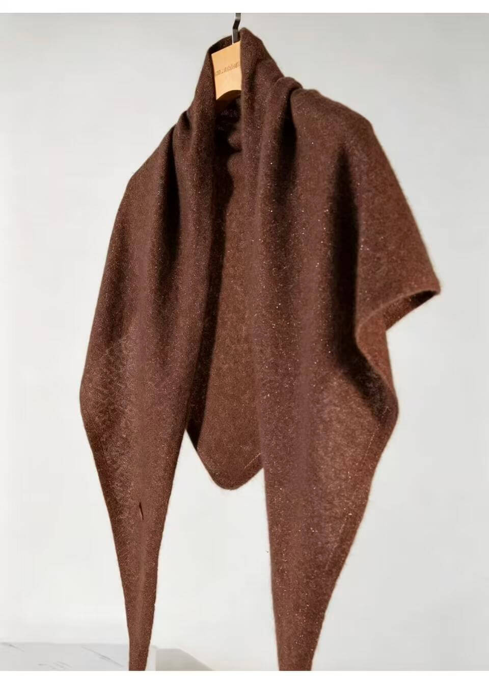 Camel brown cashmere triangle scarf with gold metallic thread sparkling in the light