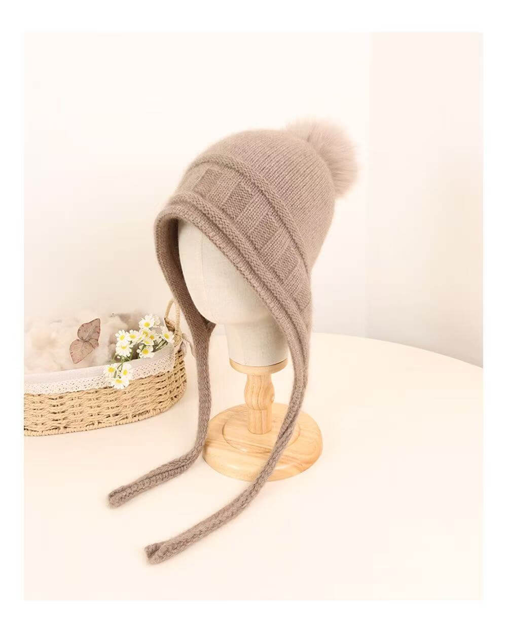 Elegant pure cashmere beanie featuring textured knit cuff and ear flaps