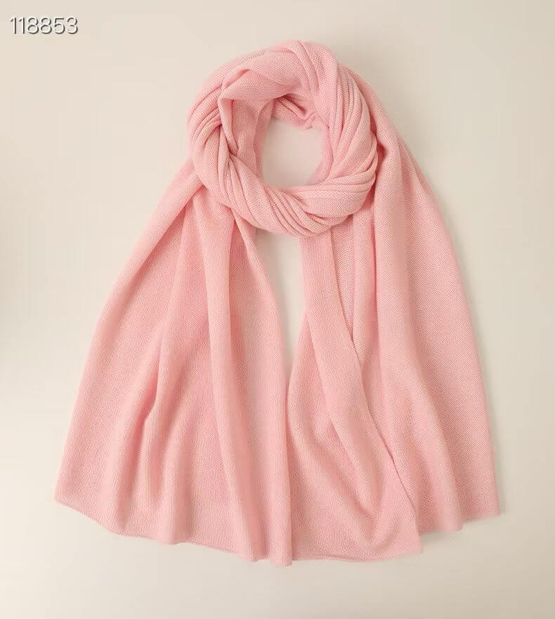 Close-up of fine 100% pure cashmere knit texture on a solid color luxury shawl