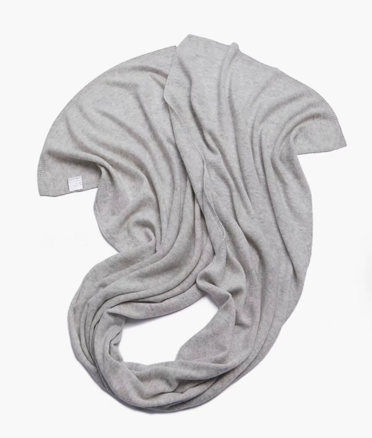 Gray women’s cashmere travel wrap, soft knit texture