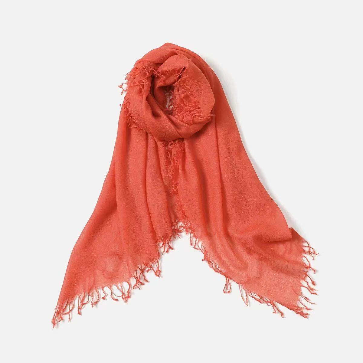 Hand-twisted edge detail on luxury cashmere scarf