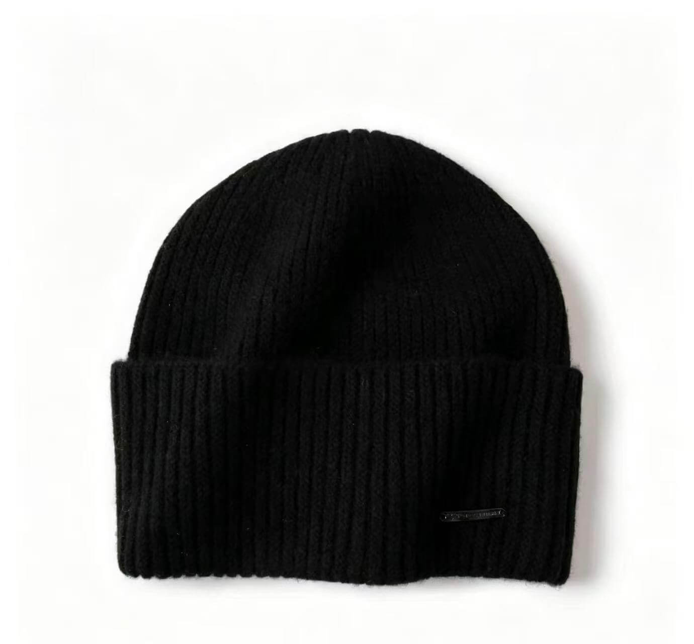 Luxury cashmere winter beanie paired with scarf and coat for elegant cold weather outfits
