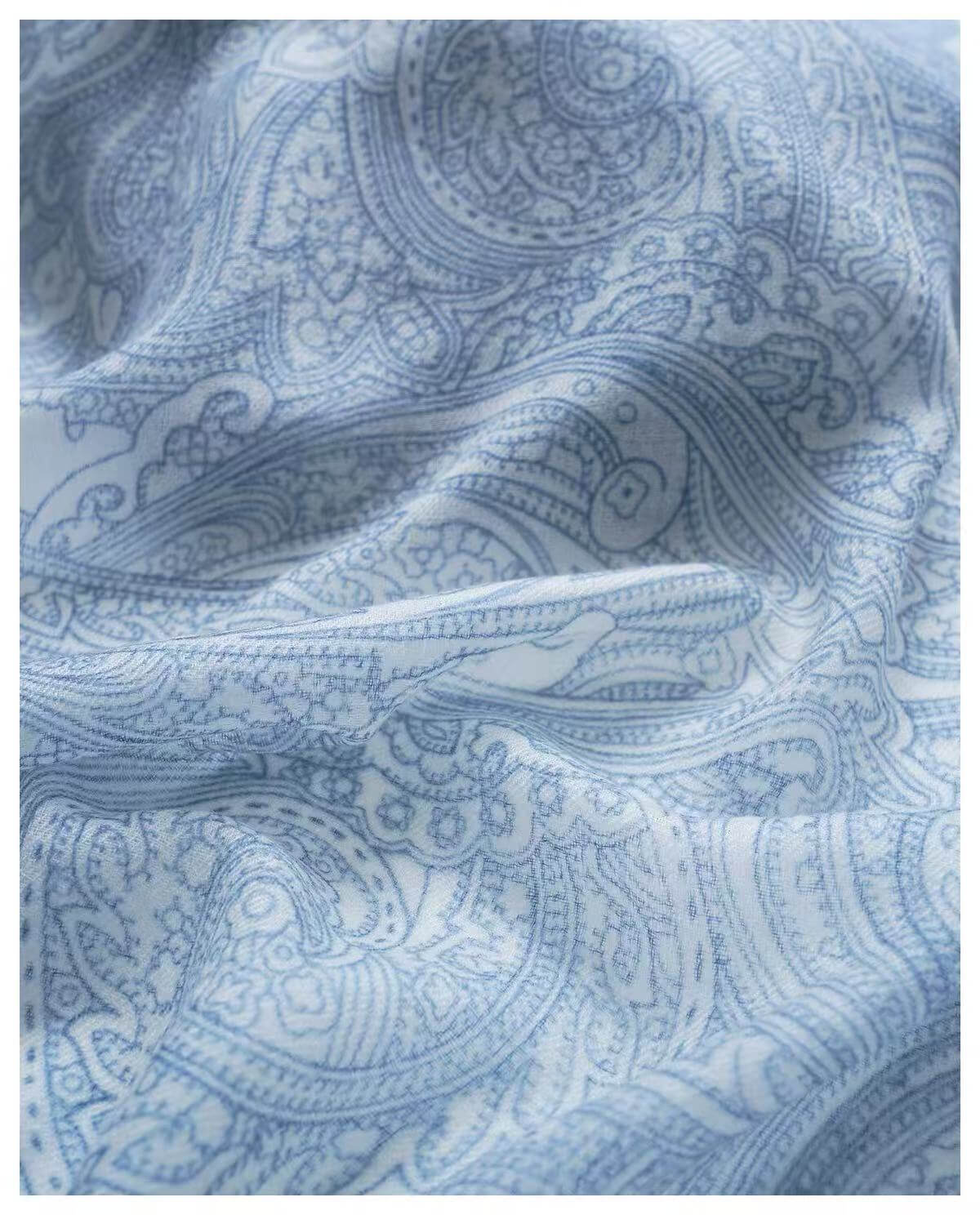 Lightweight blue cashmere shawl for travel, airplanes, and cool evenings