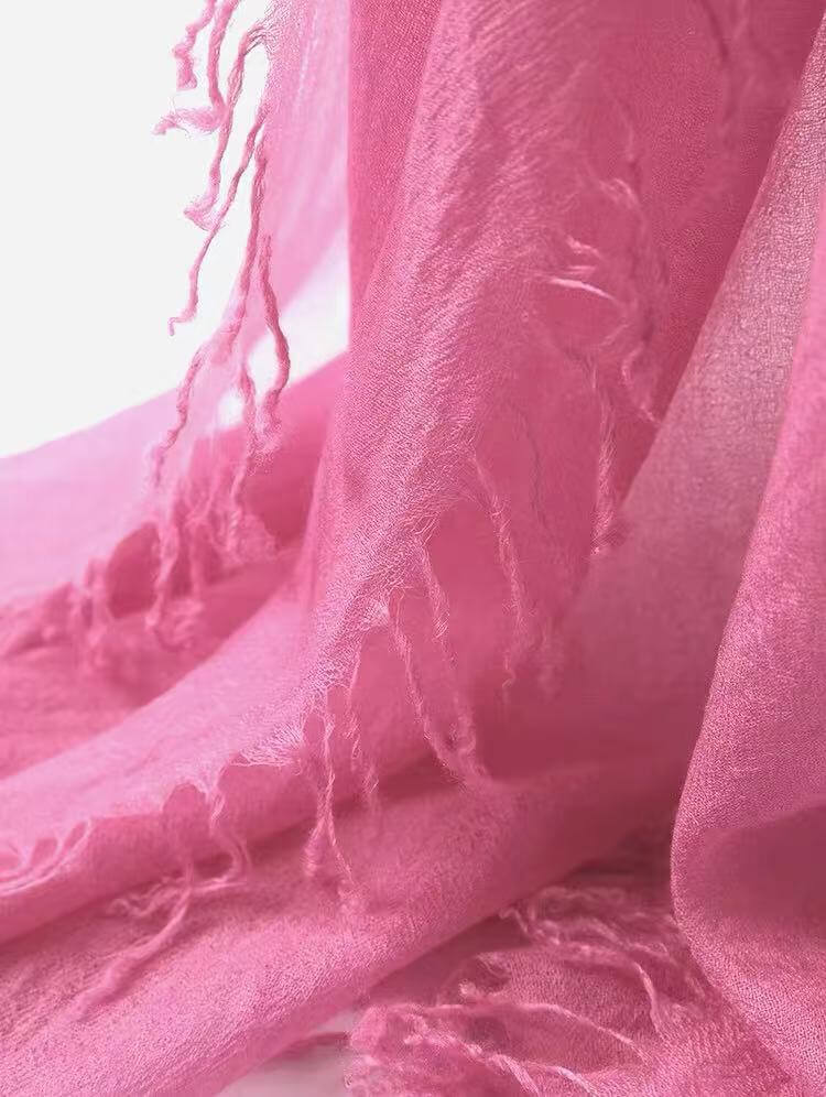 Lightweight woven cashmere scarf with soft drape and airy feel