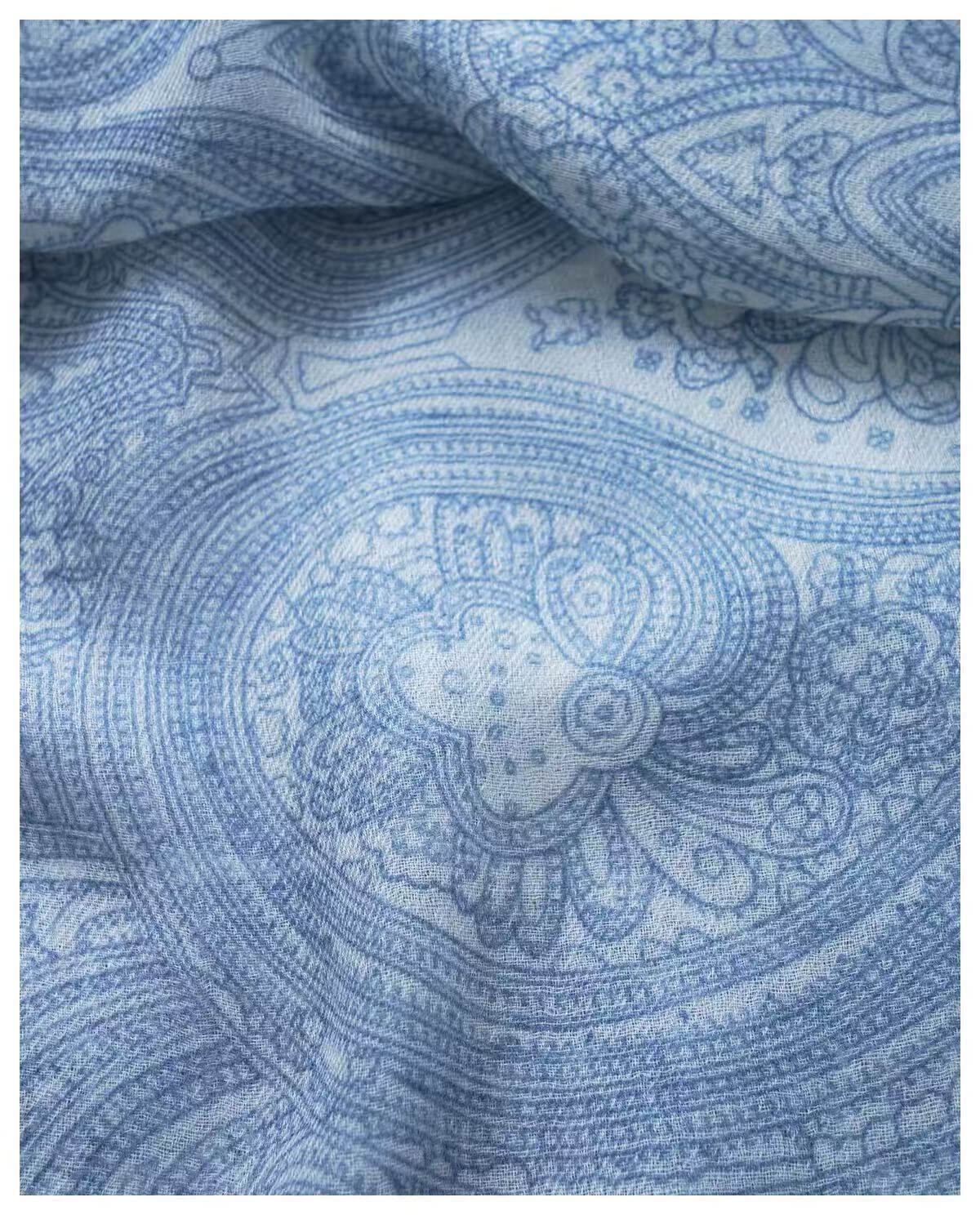 Luxury blue paisley cashmere wrap for travel and summer evenings