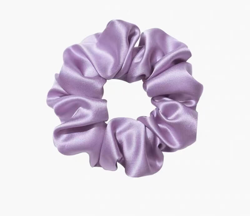 Luxury silk beauty gift set featuring three silk scrunchies and one silk eye mask