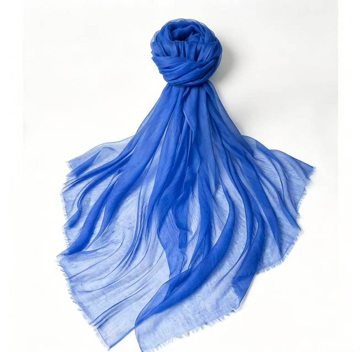 Luxury women's 100% cashmere featherweight scarf in vibrant royal blue