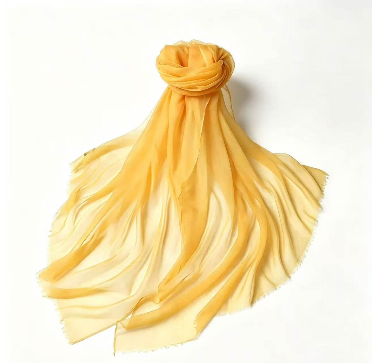 Luxury women's 100% cashmere featherweight scarf in warm golden yellow