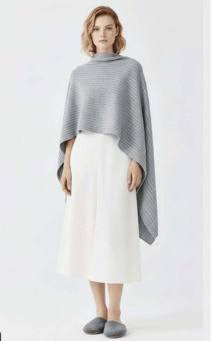 Luxury women's ribbed cashmere scarf styled as an oversized wrap for elegant winter layering and everyday wear