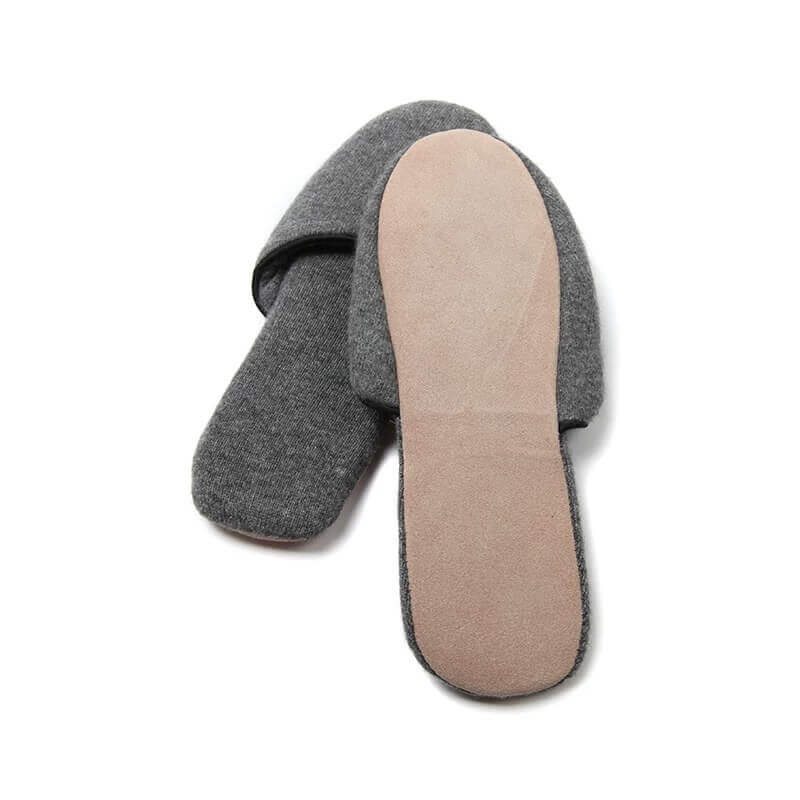 Medium gray women's 100% cashmere slippers designed for home, hotels and long-haul flights