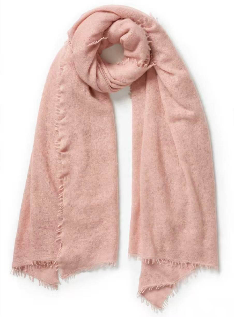 Pale pink lightweight cashmere scarf with subtle sparkling sequins and delicate fringe on all four edges.
