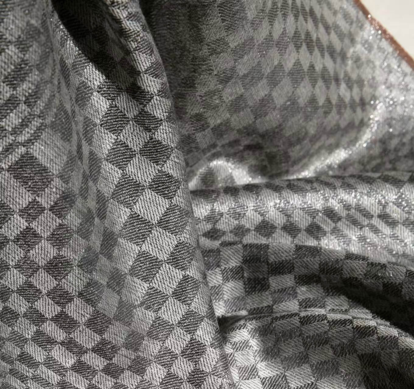 Premium 100% cashmere sparkling scarf draped over shoulders