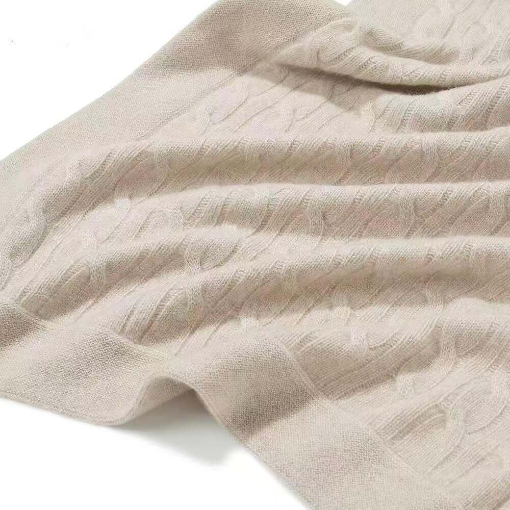 cashmere texture on knitted toddler blanket in camel color