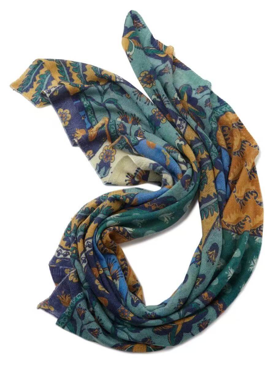 Pure cashmere printed scarf in burnt orange and dark forest tones