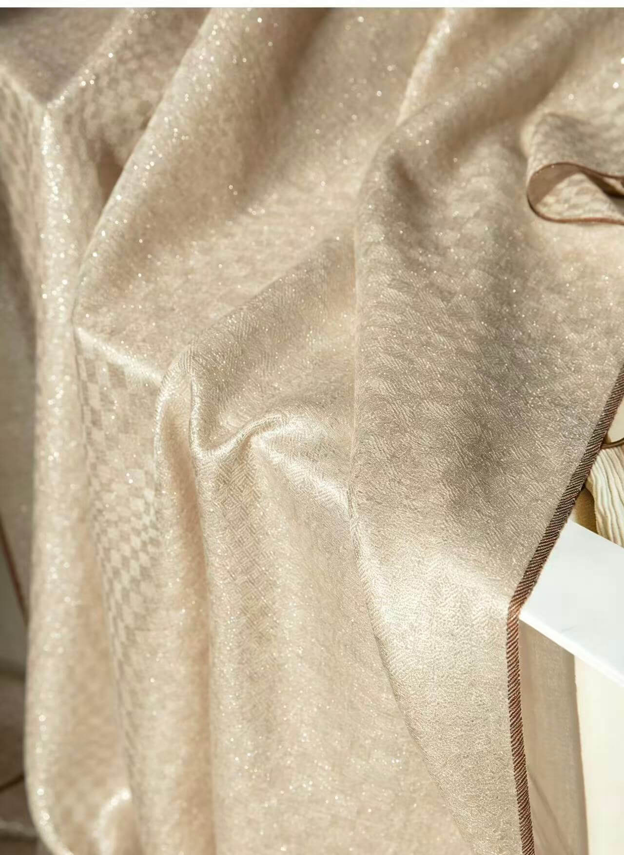 Soft beige cashmere checkerboard scarf with luminous shimmer effect