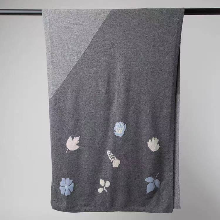 Two-tone grey cashmere shawl featuring blue and pink intarsia flowers