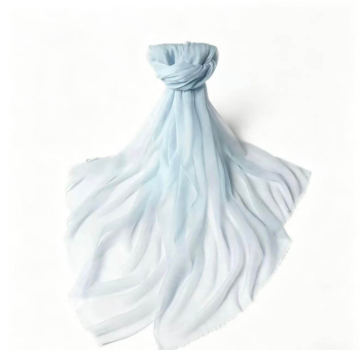 Women's featherweight 100% cashmere scarf and wrap in soft ice blue