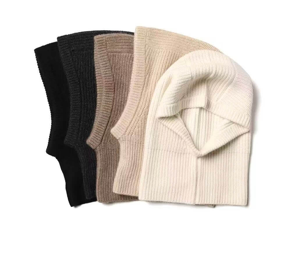 Four ribbed knit cashmere beanie hats in black, dark gray, taupe, and cream, 