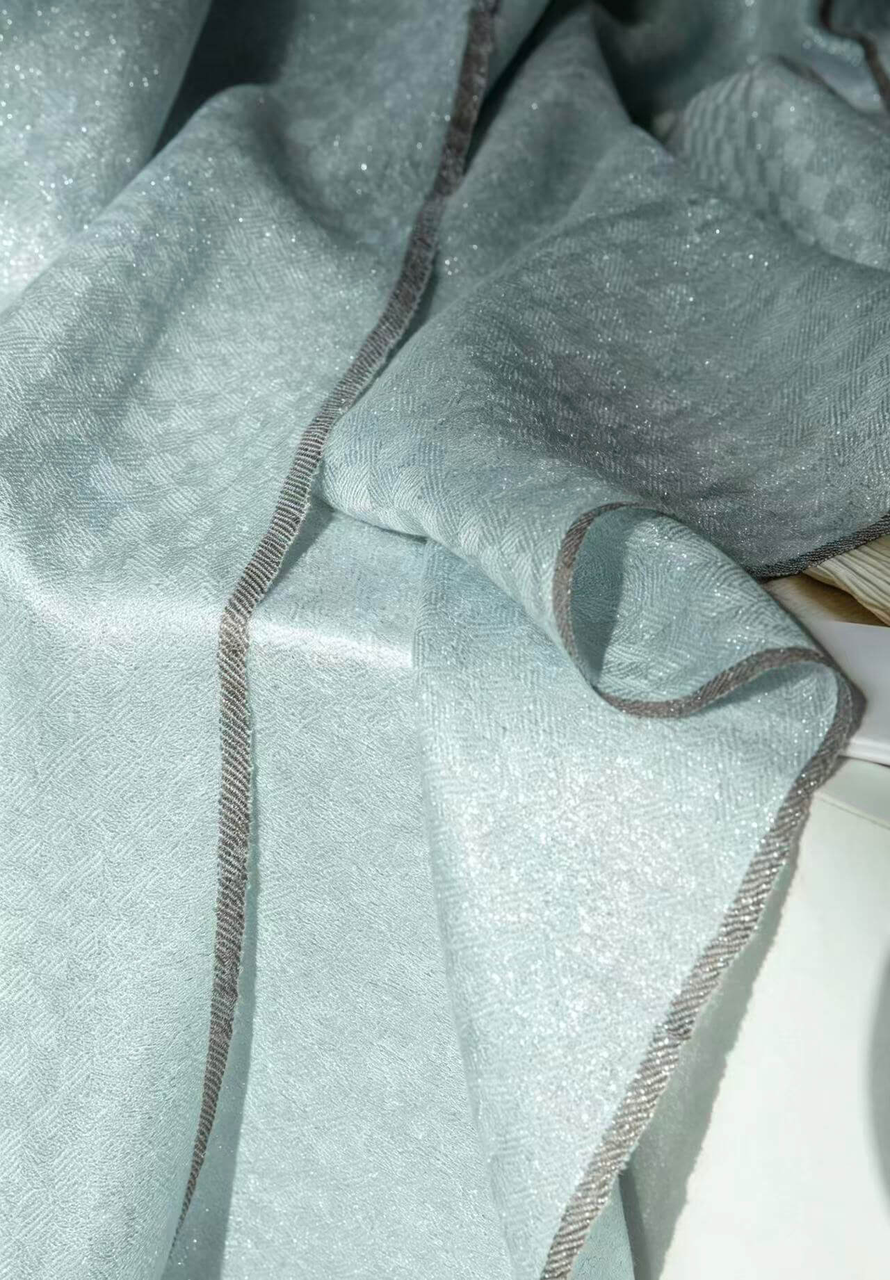 Elegant women's pure cashmere fringe wrap styled as a lightweight shawl for office wear, travel and weekend outings
