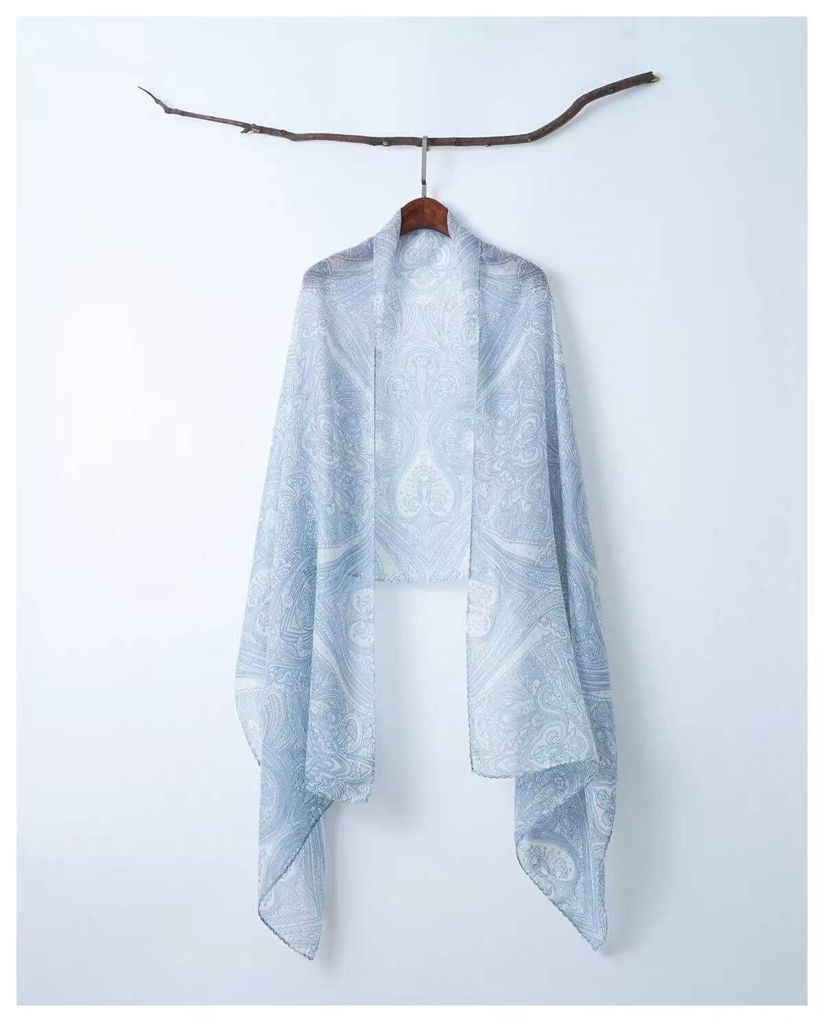 Elegant paisley print 100% cashmere wrap in clear soft blue color