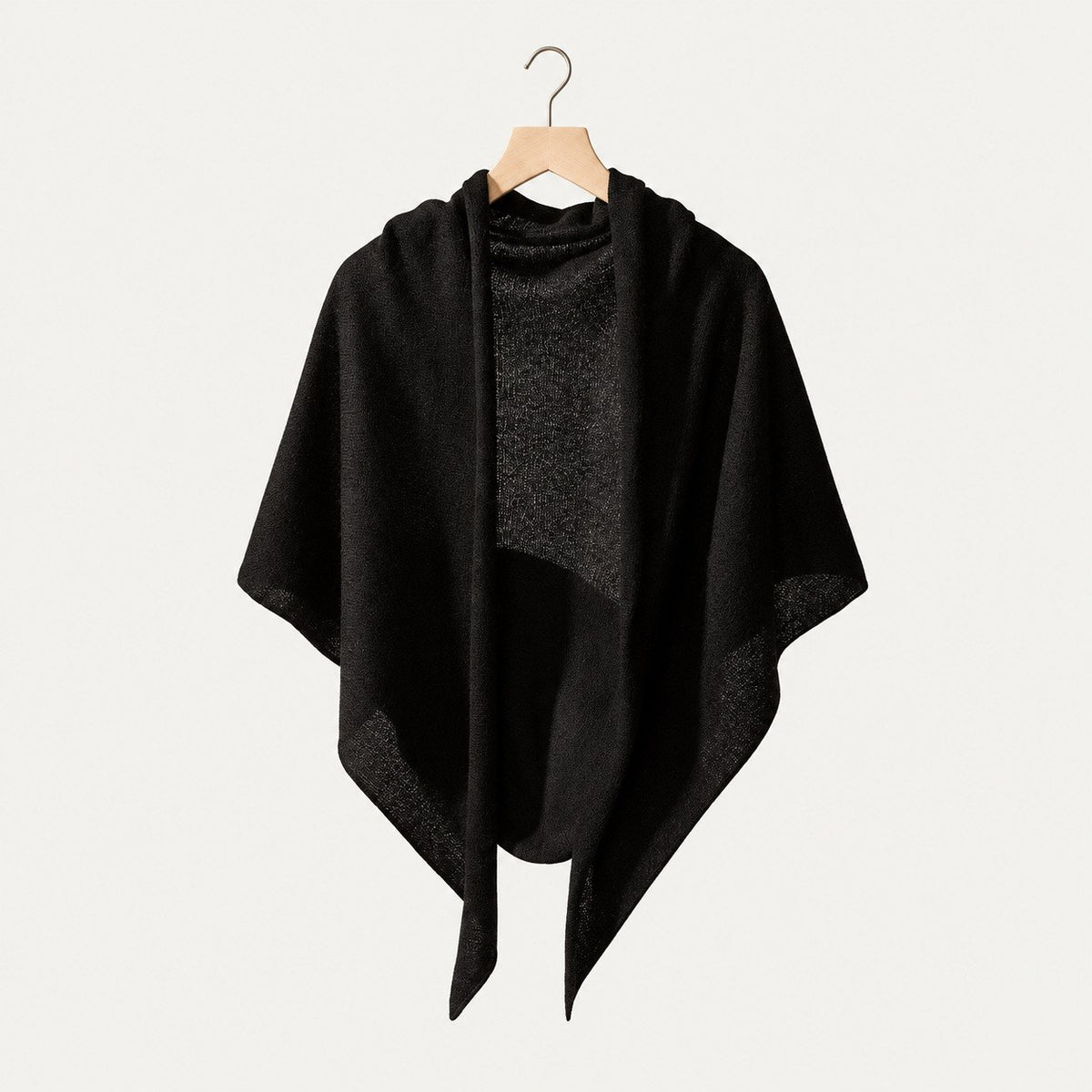 Black lightweight 100% cashmere triangle scarf on a hanger