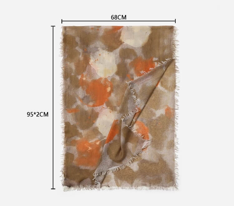 	Lightweight cashmere scarf with artistic print in coffee brown