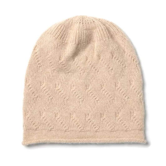 Embrace Cloud-Like Warmth: The 100% Cashmere Beanie in beige color