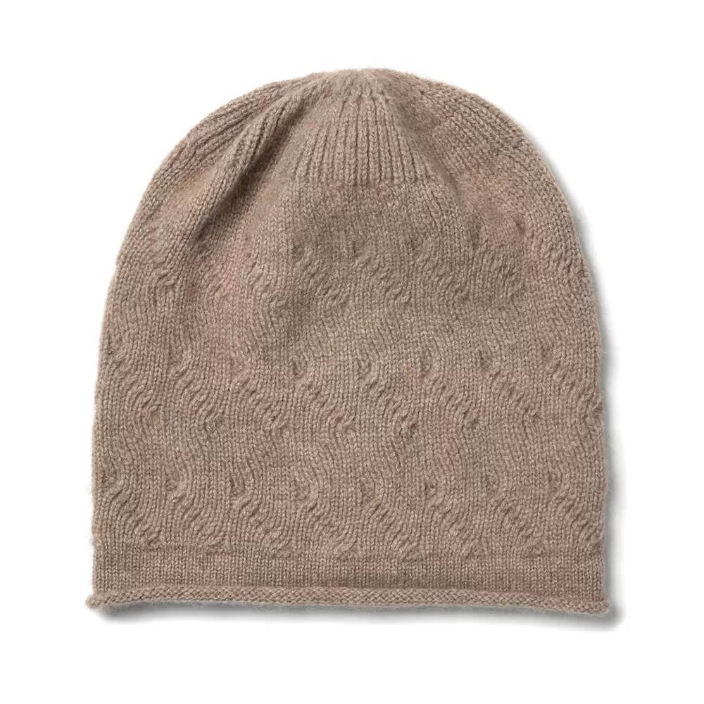 Embrace Cloud-Like Warmth: The 100% Cashmere Beanie in camel 