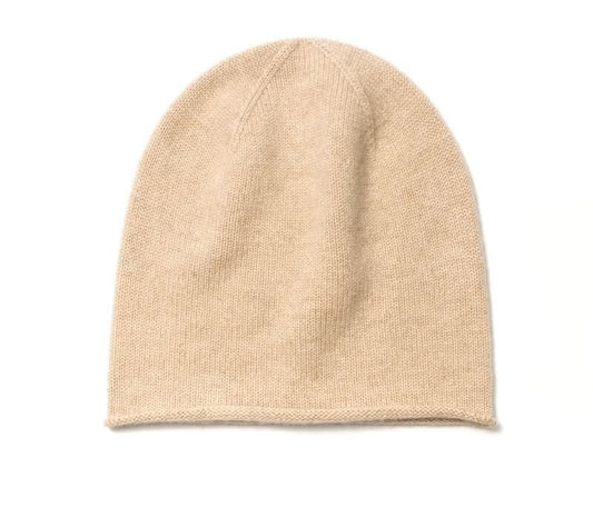 women cashmere cream beige beanie hats. Lightweight, luxurious and warm cashmere hat with a beautifully smooth feel and subtle contrasting garter-stitch hem.