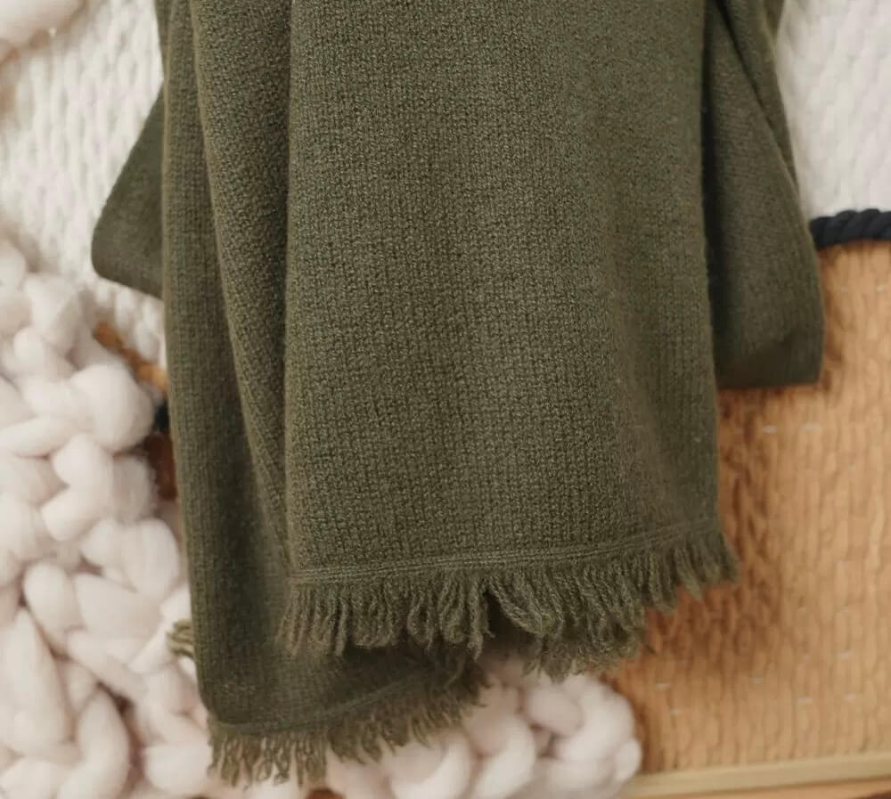 100 percent cashmere knitted scarf fringe detail showing fine craftsmanship