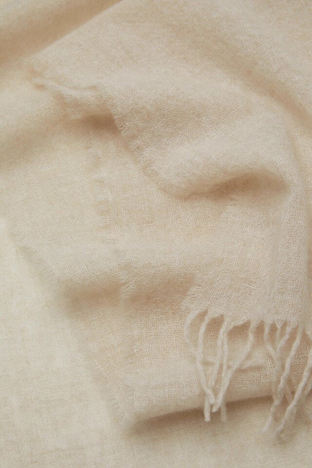 	Premium undyed cashmere shawl styled as a large winter wrap