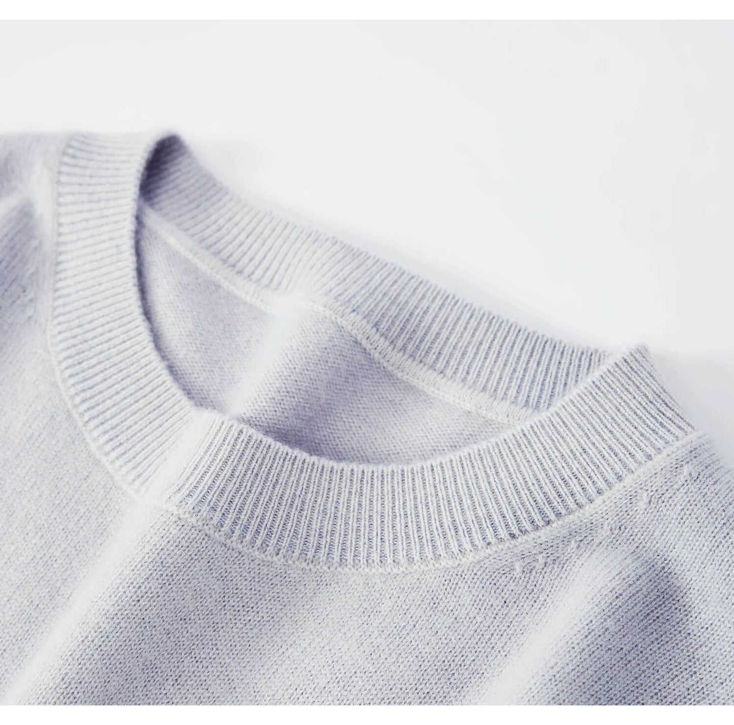 Women’s 100% cashmere sweater in blue to white ombré gradient