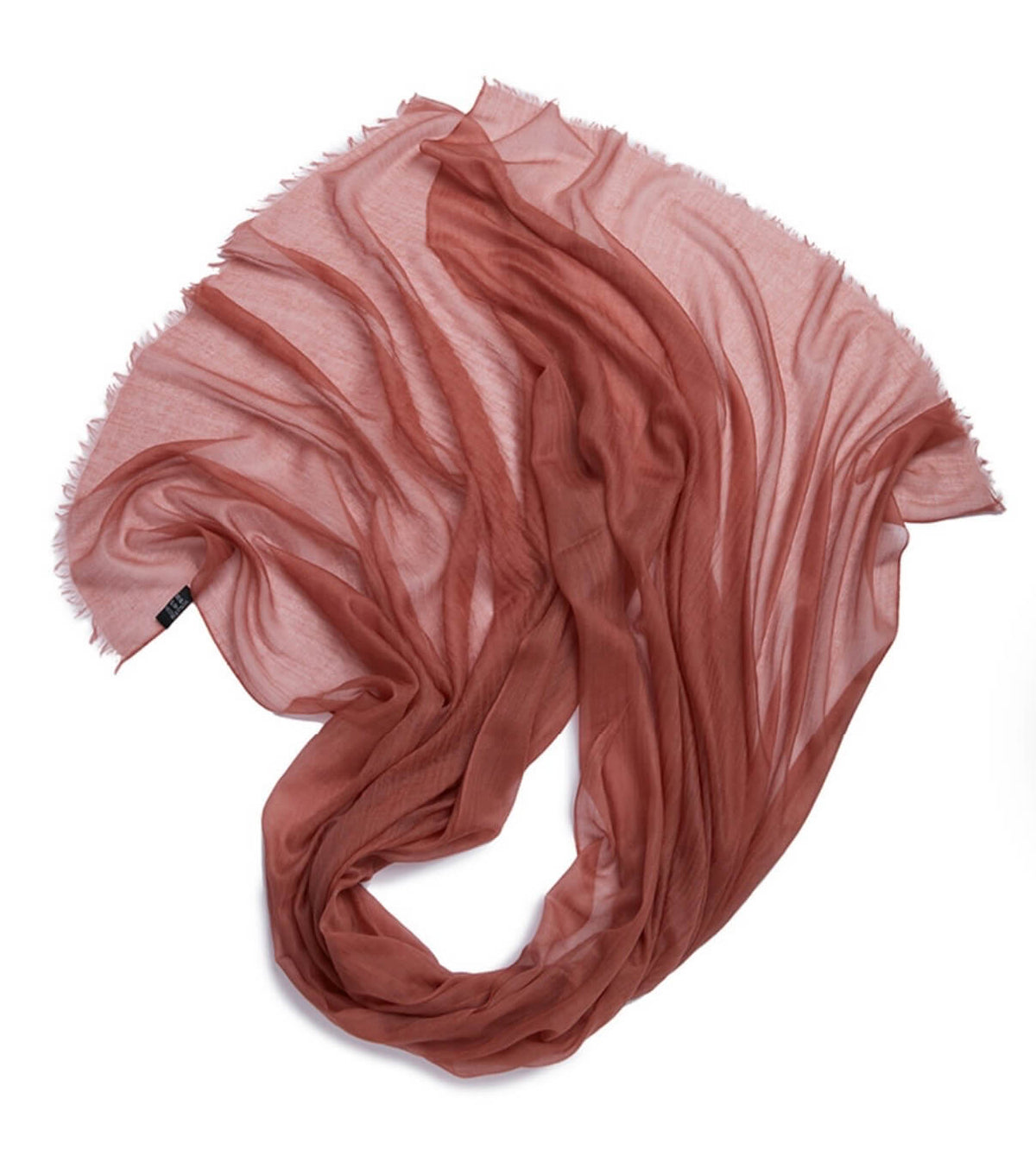 lightweight cashmere scarf with delicate folds and a soft pastel appearance
