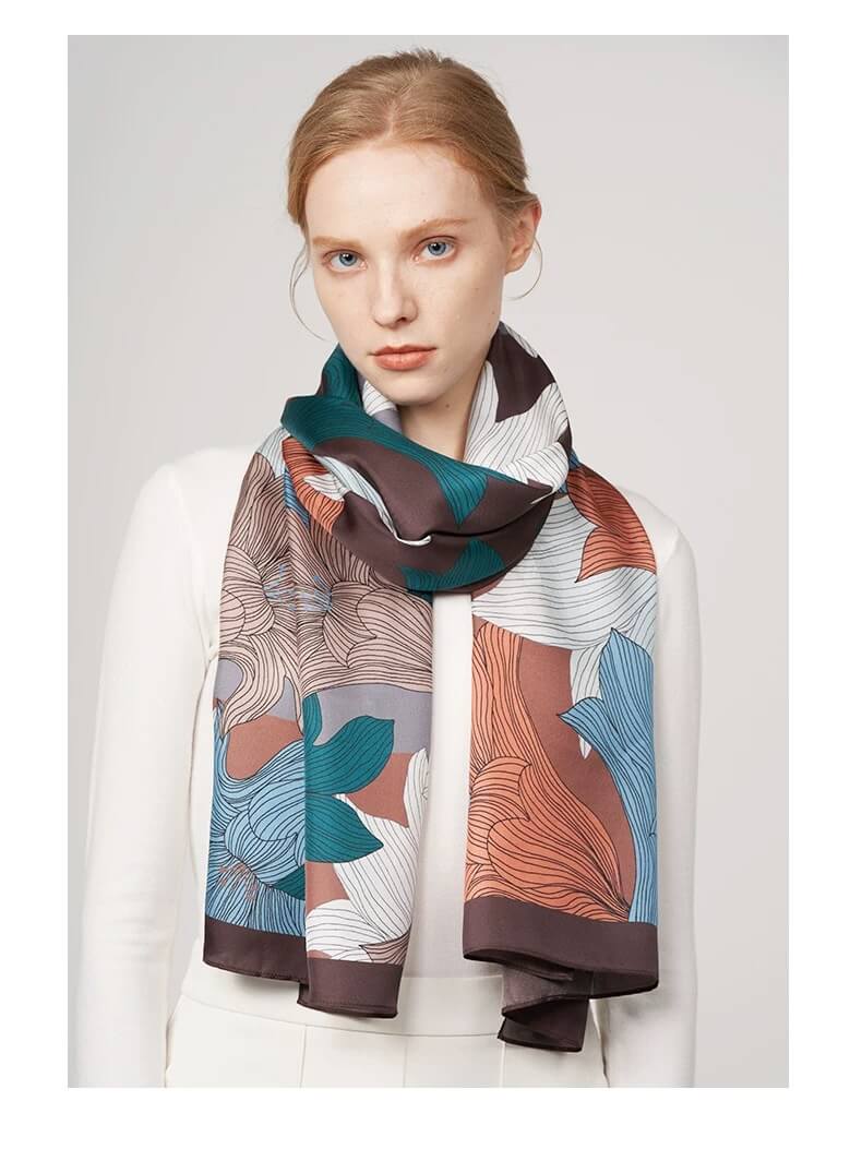 Handcrafted twill silk scarf with Nordic lily artwork