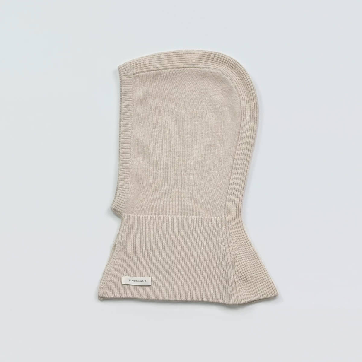 Gray cashmere balaclava with ribbed neck warmer”
“Beige cashmere hood and neck warmer set”