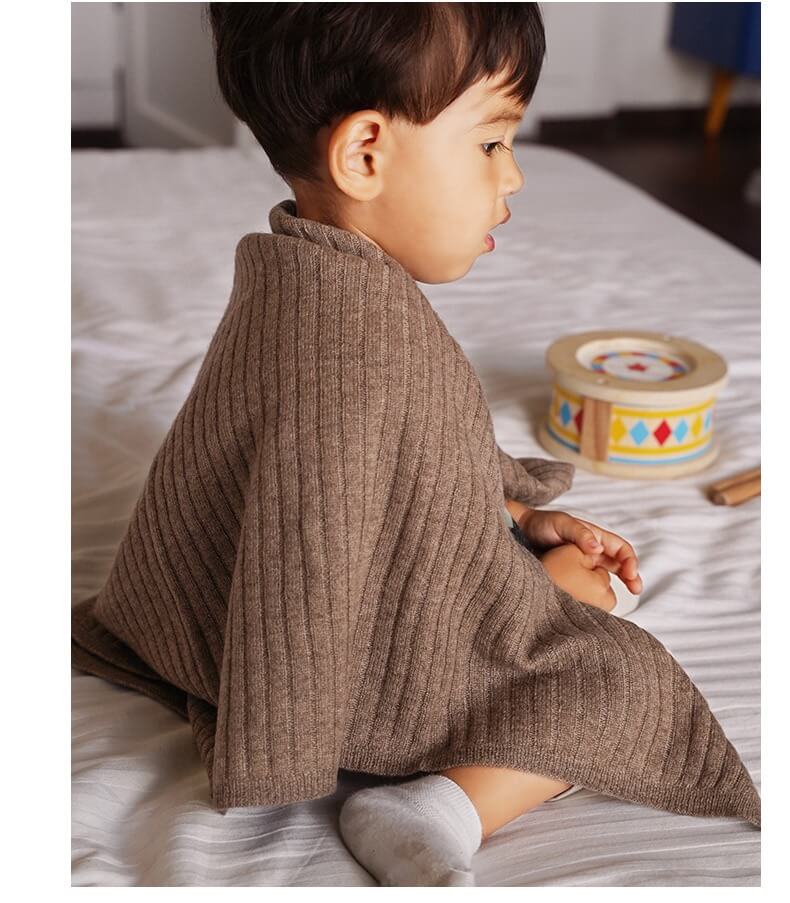 newborn cashmere blanket in camel made of fine cashmere with gentle touch