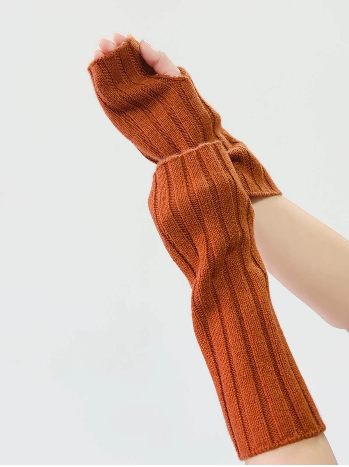 women's cashmere fingerless gloves with rib knit in orange 