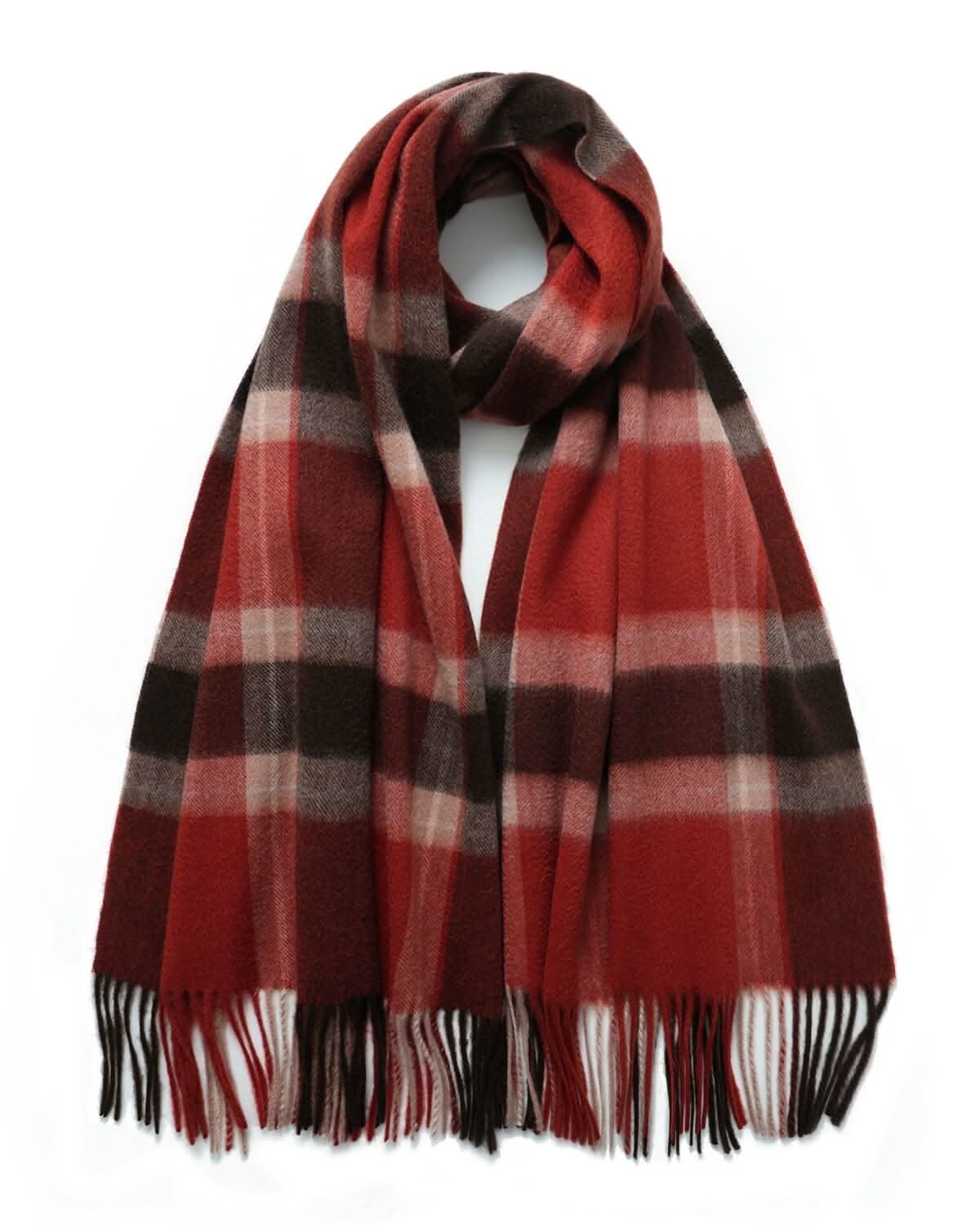 Red and brown plaid cashmere scarf shawl with fringe trim draped over a winter coat