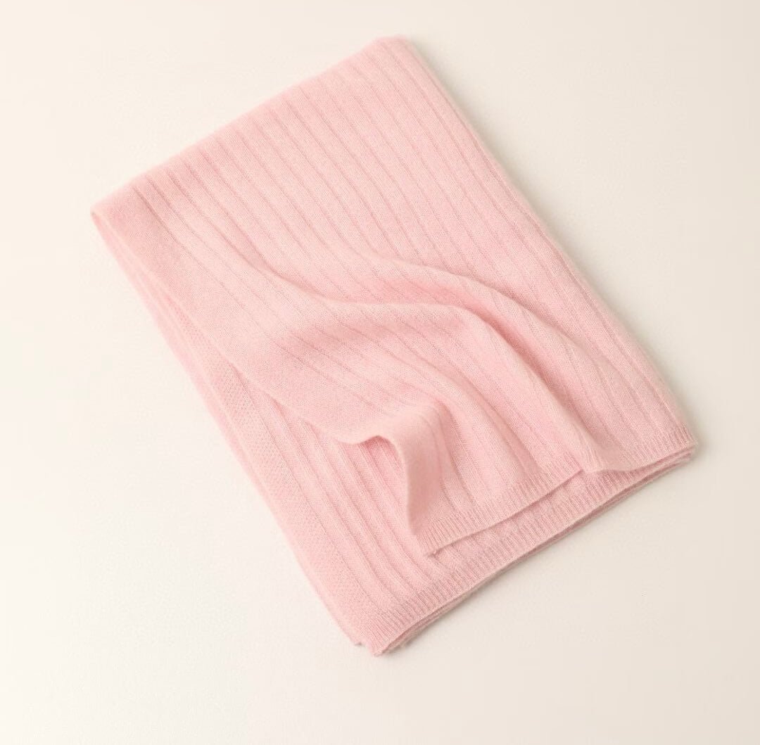 	premium baby blanket in navy made of 100% cashmere with minimalist design