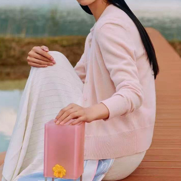 soft pure cashmere cardigan with quartz buttons close-up detail luxury knitwear