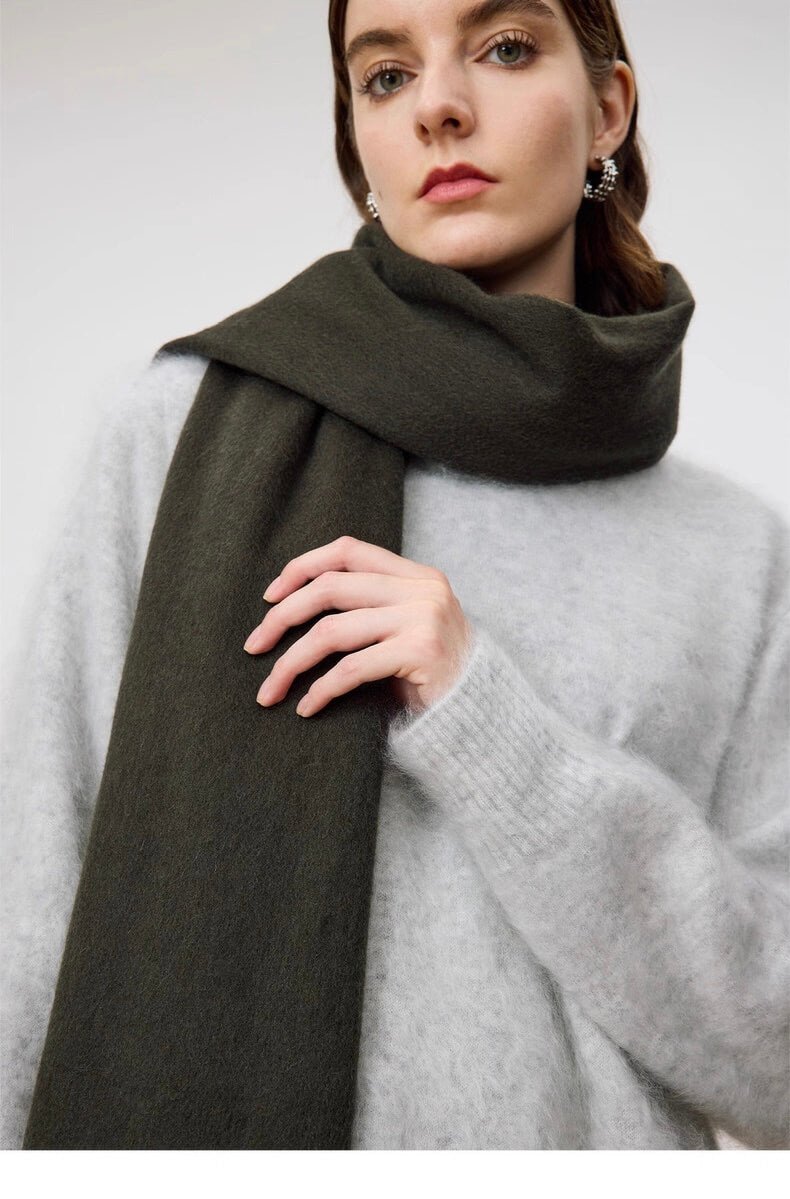 Woman wearing a army green 100% cashmere shawl scarf, luxury cashmere wrap