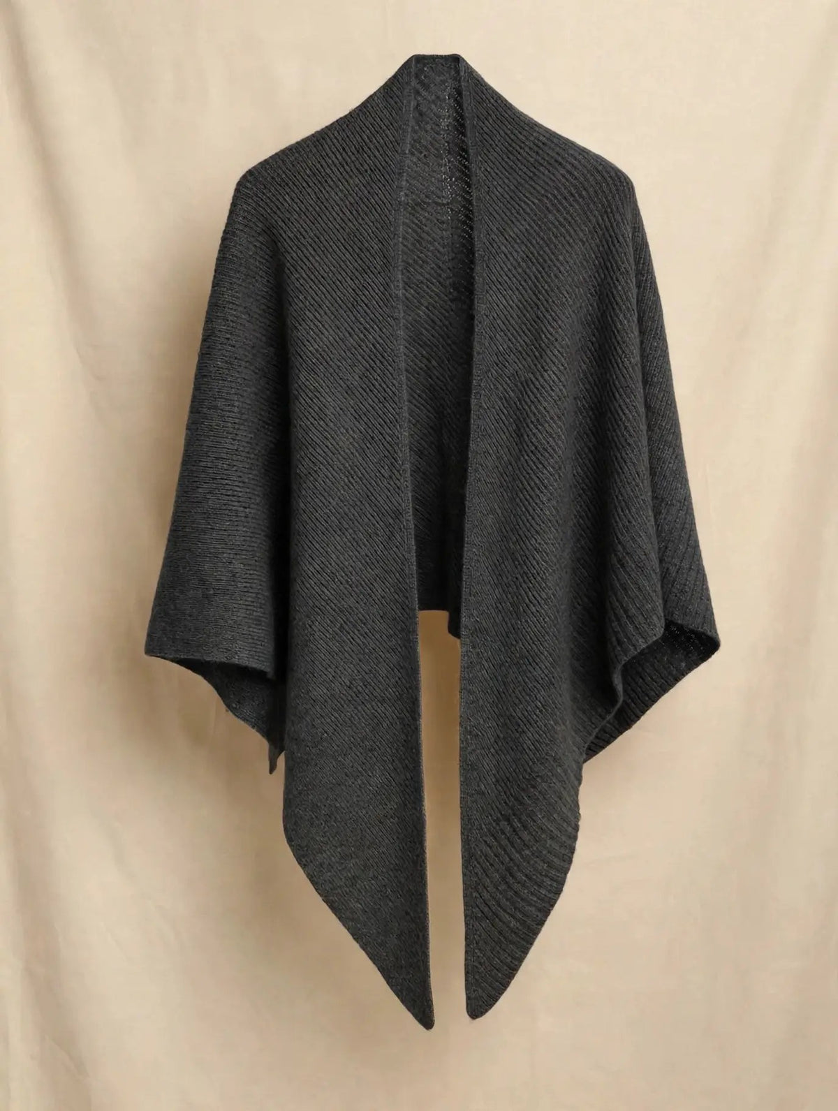 Charcoal grey 100% cashmere ribbed triangle scarf draped on an invisible mannequin, front view